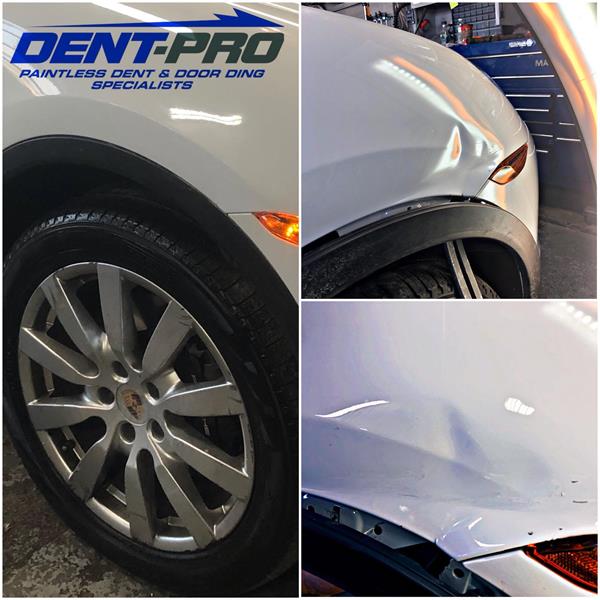 Paintless dent repair on a white Porsche aluminum front fender